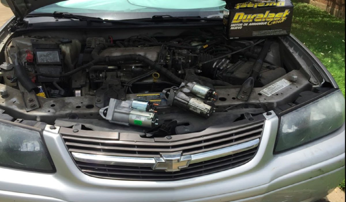 Photo of Chevy sedan getting the starter motor replaced.