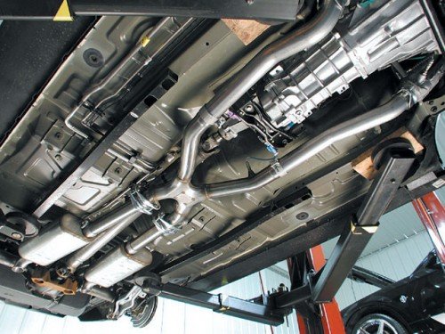 Photo of the bottom of a car showing the exhaust system for mobile auto exhaust repair.